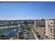 Scenic view showcasing the complex, nearby water, greenery, and distant mountain horizon at 7940 E Camelback Rd # 712, Scottsdale, AZ 85251