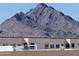 Mountain view above residential building with multiple roof vents and balcony details at 7940 E Camelback Rd # 712, Scottsdale, AZ 85251