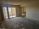 Spacious living room featuring a sliding glass door leading to a balcony, ready for customization at 7940 E Camelback Rd # 712, Scottsdale, AZ 85251