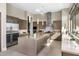 Spacious kitchen with sleek cabinetry, a center island, and high-end appliances, perfect for cooking at 8145 E Tecolote Cir, Scottsdale, AZ 85266