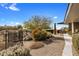 Beautiful desert landscaping, including native plants, gravel, and views of the surrounding desert and distant mountains at 8145 E Tecolote Cir, Scottsdale, AZ 85266