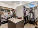 Large walk-in closet with custom shelving and ample storage at 8145 E Tecolote Cir, Scottsdale, AZ 85266