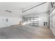 Spacious two-car garage with utility sink, metal shelves and ample room for storage at 9212 E Cedar Basin Ln, Gold Canyon, AZ 85118