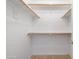 Walk-in closet features shelving and hanging rods at 9212 E Cedar Basin Ln, Gold Canyon, AZ 85118