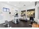 Bright fitness center featuring treadmills, ellipticals, and weight machines at 9270 E Thompson Peak Pkwy # 370, Scottsdale, AZ 85255