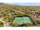 Aerial view of well-maintained tennis courts within a vibrant and active community at 9270 E Thompson Peak Pkwy # 370, Scottsdale, AZ 85255