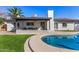 Backyard with a covered patio and a pool at 951 W La Jolla Dr, Tempe, AZ 85282