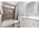 Bathroom with tiled shower/tub combo and white vanity at 951 W La Jolla Dr, Tempe, AZ 85282
