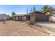 Charming single-story brick home with low-maintenance desert landscaping and an attached two-car garage at 951 W La Jolla Dr, Tempe, AZ 85282
