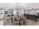 Open concept living space with dining area, kitchen, and comfortable seating at 951 W La Jolla Dr, Tempe, AZ 85282