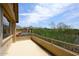 Outdoor patio with mountain views surrounded by mature landscaping at 9901 E Bahia Dr, Scottsdale, AZ 85260