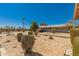 Expansive desert backyard offering ample space, privacy, and potential for customization at 1015 N 193Rd Ave, Buckeye, AZ 85326