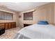 Cozy bedroom with neutral walls, window blinds, and classic wooden furniture at 1015 N 193Rd Ave, Buckeye, AZ 85326