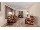 Spacious living room featuring tile flooring, and vintage furnishings at 1015 N 193Rd Ave, Buckeye, AZ 85326