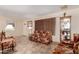 Bright living room boasting tile floors, vintage decor, and natural light at 1015 N 193Rd Ave, Buckeye, AZ 85326