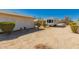 Sideyard showing parking for RV, space for boat parking, and plenty of space for storage at 1015 N 193Rd Ave, Buckeye, AZ 85326