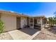 Exterior patio with a view to an enclosed porch at 10609 W Concho Cir, Sun City, AZ 85373