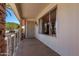 Covered front porch with desert landscaping and a view of mountains at 10609 W Concho Cir, Sun City, AZ 85373