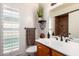 Tastefully decorated bathroom with modern fixtures and ample natural light at 11010 W Acacia Dr, Sun City, AZ 85373