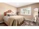 Relaxing bedroom with a large window and soft, neutral tones at 11010 W Acacia Dr, Sun City, AZ 85373