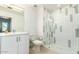 Bathroom featuring glass shower, white cabinets, and a modern vanity at 1130 N 2Nd St # 103, Phoenix, AZ 85004