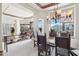 Dining room with rustic wood table, decorative lighting, and mountain view at 12160 E Whispering Wind Dr, Scottsdale, AZ 85255