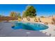 Enjoy this backyard pool with waterfall feature, desert landscaping, privacy fence, and plenty of sunshine at 1244 W Castle Dr, Casa Grande, AZ 85122