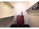 Walk-in closet with built-in shelving and storage space at 13623 N 108Th Dr, Sun City, AZ 85351