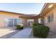 Charming home featuring desert landscaping, covered entry, and a tranquil, inviting facade at 13623 N 108Th Dr, Sun City, AZ 85351