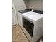 This laundry room features a modern washer and dryer with easy access from the nearby rooms at 1414 E Moreland St, Phoenix, AZ 85006