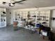 Finished garage interior featuring tons of shelving and storage space at 1440 E Grove Ave, Mesa, AZ 85204