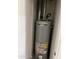 Energy efficient A.O. Smith water heater installed in a closet with white walls at 1440 E Grove Ave, Mesa, AZ 85204