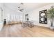 Bright dining area with modern decor, light wood floors and large bay window at 14820 N 44Th Pl, Phoenix, AZ 85032