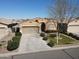 Attractive single-Gathering home with a manicured front lawn, mature landscaping, and a two-car garage at 1658 W Paisley Dr, San Tan Valley, AZ 85144