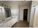 Bathroom featuring a shower and vanity with countertop and cabinet at 17345 N Costa Brava Ave, Maricopa, AZ 85139