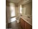 Bathroom featuring a shower and vanity with countertop and cabinet at 17345 N Costa Brava Ave, Maricopa, AZ 85139