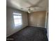 Comfortable bedroom with carpeted floors and window at 17345 N Costa Brava Ave, Maricopa, AZ 85139