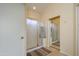 Clean bathroom showcasing a shower with glass doors and neutral color scheme at 17553 N Thornberry Dr, Surprise, AZ 85374