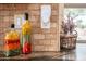 Close-up of kitchen counter decor with decorative jars and a small basket of dried flowers at 17553 N Thornberry Dr, Surprise, AZ 85374