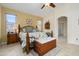 Warm, inviting main bedroom with stylish furnishings, a ceiling fan, and lots of natural light at 17553 N Thornberry Dr, Surprise, AZ 85374