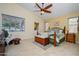 Serene main bedroom with a decorative bed, and windows providing natural light at 17553 N Thornberry Dr, Surprise, AZ 85374