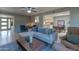 Bright living room showcases tile floors, modern furniture, and an open layout at 2212 W Claremont St, Phoenix, AZ 85015