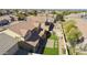 An aerial view of backyard space, including lush green lawn and charming patio at 2428 E Iris Dr, Chandler, AZ 85286