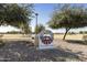 Centennial Park's sign is surrounded by trees at 2428 E Iris Dr, Chandler, AZ 85286