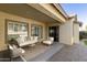 Inviting covered patio area complete with stylish outdoor seating, perfect for entertaining at 2428 E Iris Dr, Chandler, AZ 85286