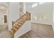 Bright and airy entryway featuring a grand staircase and high ceilings at 2428 E Iris Dr, Chandler, AZ 85286