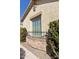 Close-up of the exterior of the home highlighting the stone accents and desert landscaping at 2428 E Iris Dr, Chandler, AZ 85286