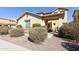 Charming front porch with decorative fountain and lovely desert landscaping at 2428 E Iris Dr, Chandler, AZ 85286