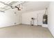 Spacious garage with epoxy floors and ample room for parking and storage at 2428 E Iris Dr, Chandler, AZ 85286