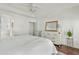 Spacious main bedroom with white paneled walls and a view to the adjacent main bathroom at 2626 E Valencia St, Gilbert, AZ 85296